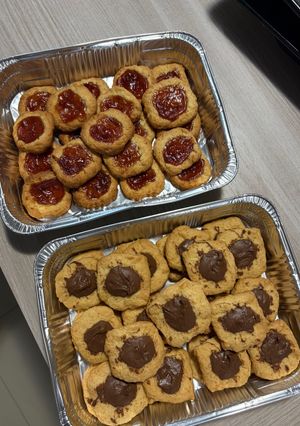 Foto di Bocconcini di frolla con marmellata e cioccolato🍓🍫