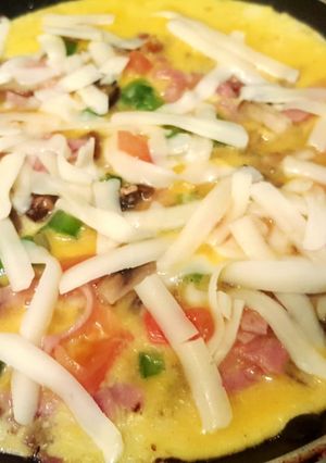 A picture of Ham,cheese and mushroom stuffed omelette.