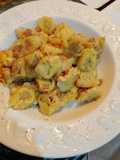 Tortellini al prosciutto crudo con pane integrale speziato