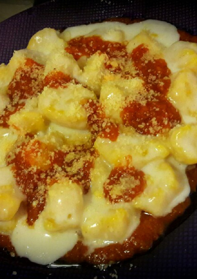 Una foto de Ñoquis de zapallo con salsa blanca y fileto