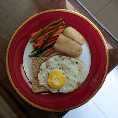 A picture of Pan Fried Dory with Vegetable Fries and Egg Toast.