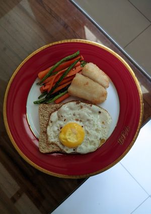 A picture of Pan Fried Dory with Vegetable Fries and Egg Toast.