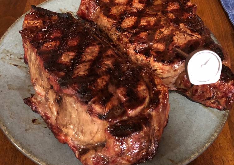 3 inch thick ribeye steak on BBQ