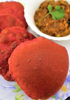 A picture of Stuffed Beetroot Paneer Poori.