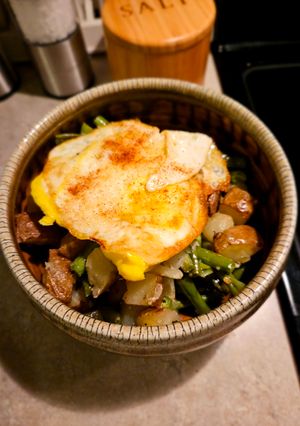 A picture of Potatoes with Green Beans and Eggs.