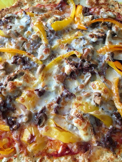 Una foto de Pizza con masa de coliflor