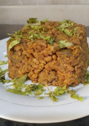 A picture of Porridge beans with half ripe Plantain.