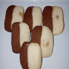 A picture of Biscuits in two colours 🍪 🍪.