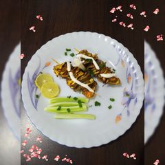 A picture of Roasted eggplant tikka.