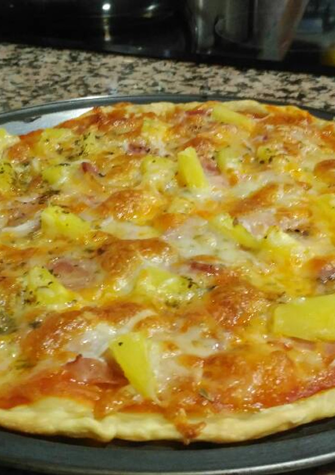 Una foto de Pizza hawaina