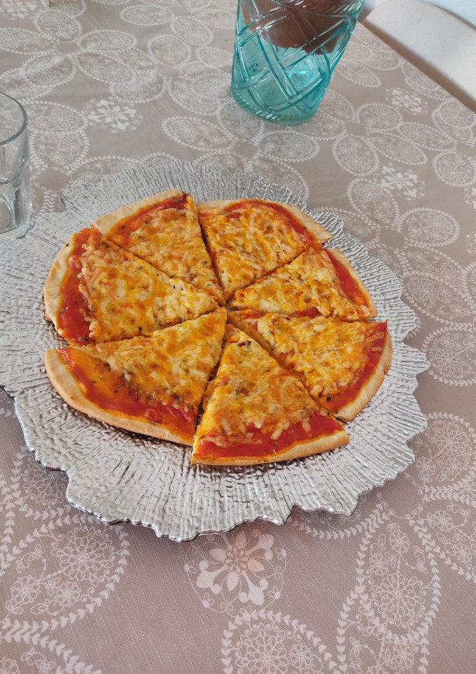 Una foto de Pizza 4 quesos