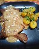 Costillas de cerdo con salsa de naranja y almendras