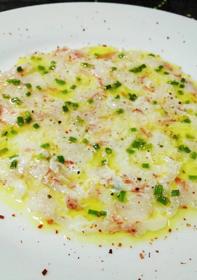 Una foto de Carpaccio de gambas