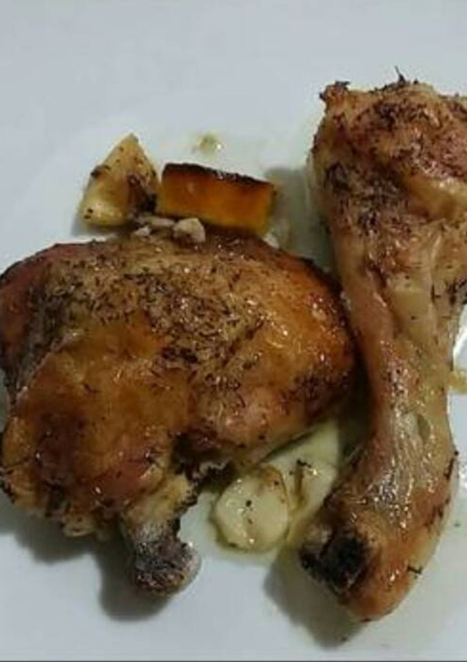 Una foto de Contramuslos y alitas de pollo al horno