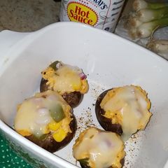 A picture of Buffalo Chicken Dip Stuffed Baked Mushrooms.