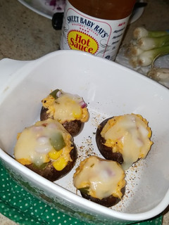 A picture of Buffalo Chicken Dip Stuffed Baked Mushrooms.