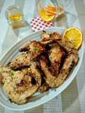 Alitas de pollo condimentadas con naranja especiada y romero