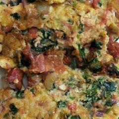 A picture of Eggs with coriander.