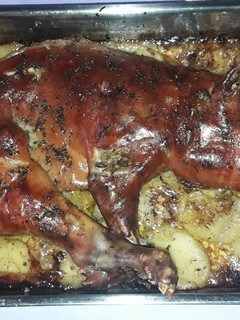 Una foto de Cochinillo al horno