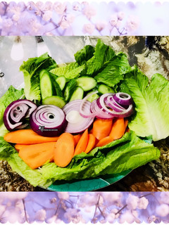 A picture of Veggies salad with dash of vinegar.