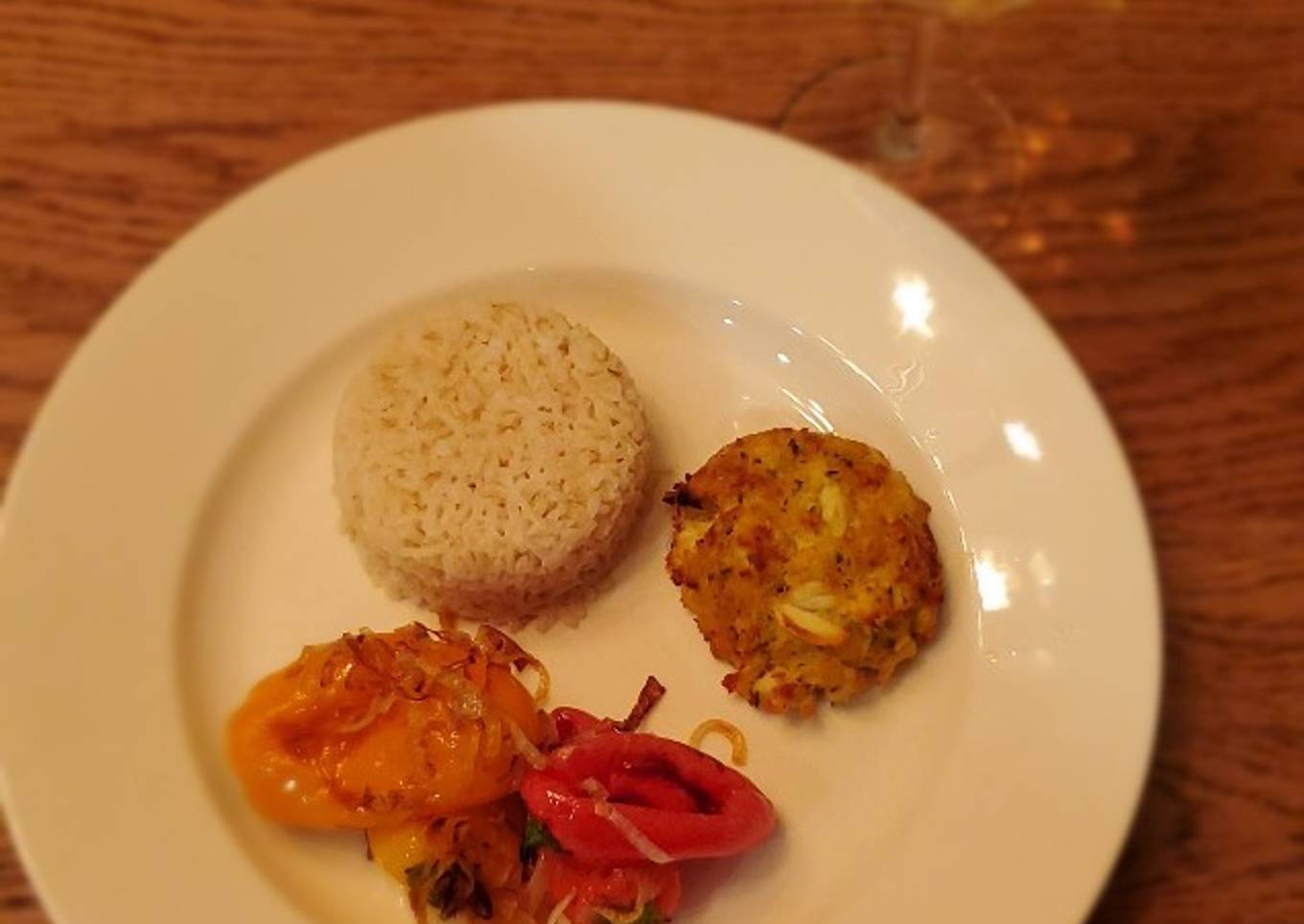 Crab cakes with rice and sautéed veggies