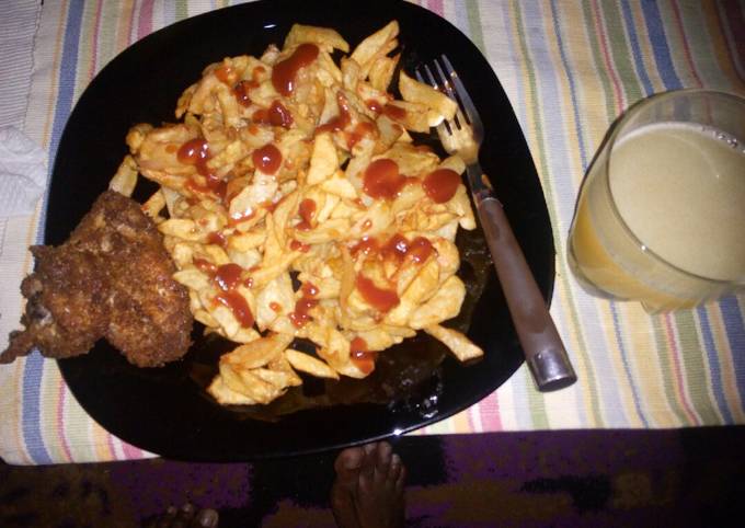 French fries, coated chicken and fresh pineapple juice...