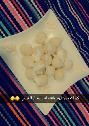 صورة لوصفة كرات جوز الهند بالقشطه والعسل الطبيعي ❤