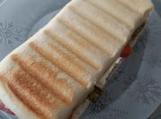 Une photo de panini jambon