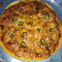 Smokey bbq chicken pizza A picture of Smokey bbq chicken pizza.