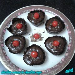 A picture of Chocolate mousse in chocolate cups.