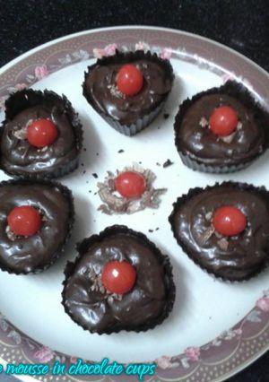 A picture of Chocolate mousse in chocolate cups.