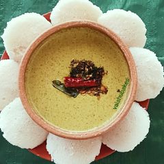 A picture of Idli and Daal Chutney.