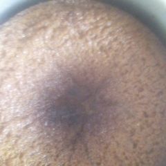 A picture of Baking a vanilla cake using a jiko.