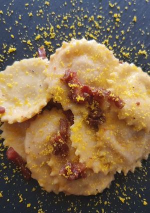 A picture of Ricotta and Bell Pepper Ravioli in Special Carbonara.