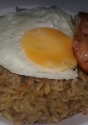 A picture of Noodles Sunny Side Up and Grilled Chicken.