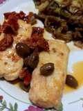 Merluzzo con olive e pomodori secchi