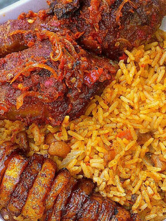 A picture of Jollof rice and beans.