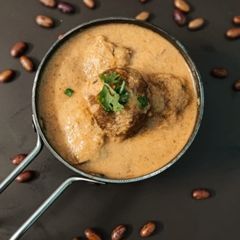 A picture of Peanut rajma kofta curry.