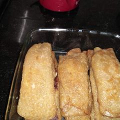 A picture of Patisapta (bengali dessert).