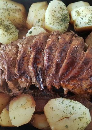 Una foto de Carne con papas