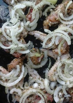 Una foto de Alitas encebolladas al horno