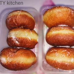 A picture of Pillow doughnuts with white line.