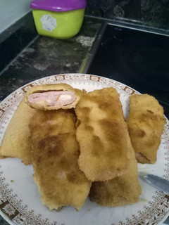 Una foto de Rollitos de lomo adobado