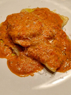 A picture of Goat Cheese Pancetta Ravioli with a Spicy Citrus Sauce.