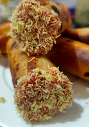 A picture of Rotli cigars using leftover farsan after Diwali.