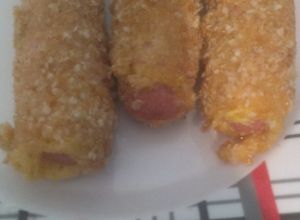Una foto de Salchichas envueltas en fiambre y apanadas!
