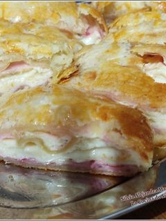 Una foto de Hojaldre con jamón y queso cremoso