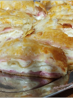 Una foto de Hojaldre con jamón y queso cremoso