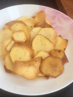 Una foto de Papas crujientes