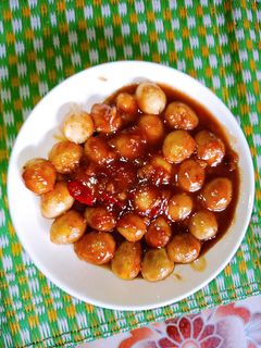 Hình của món Trứng cút sốt me cay.